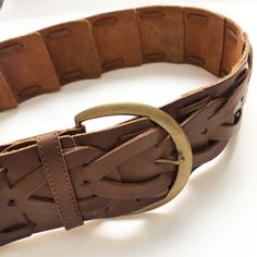 "This is a wide beautifully crafted vintage belt. It features thick brown leather squares with a tear shape pieced together and accented with a large demi circle brass buckle. Excellent vintage condition. MEASUREMENTS: Length: adjustable from 27.5\" (70 cm) to 36\" (91 cm) Width: 2.75\" (7 cm) Buckle: 3.5\" (9 cm) x 3\" (8 cm) * Please note the colour on the pictures may vary due to monitor settings and light reflections. ❤ Thank you for your visit! ❤ For more fabulous vintage finds:  https://ww Brown Leather Belt With Brass Hardware, Brown Bohemian Belt With Brass Buckle, Brown Leather Belt Buckles With Antique Buckle, Brown Leather Belt Buckle With Antique Detail, Brown Leather Belt Buckle With Antique Style, Brown Leather Belt Buckle With Antique Design, Brown Leather Antique Belt Buckle, Adjustable Brown Belt With Brass Buckle, Vintage Adjustable Brown Belt Buckles