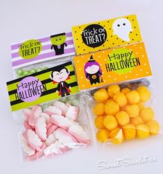 halloween treat bags filled with candy and candies