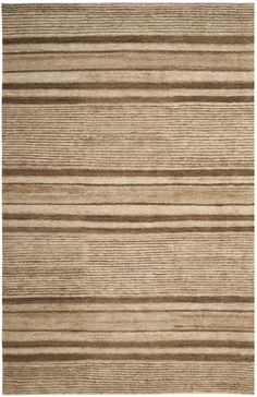 an area rug with brown and beige stripes