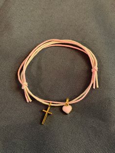 "Martyrika-Witness Bracelets- Greek Orthodox Baptism gold cross pink enamel heart Double Wax cord (baby pink/ivory) bracelets come packaged in a giftbox. What you see in the photos are samples; I will re-create your bracelets as close as I can to what you see, or in any variation you would like. Martyrika is a Greek word which means '\"sign of witnessing\". Traditionally in Greek Orthodox Baptisms, Martyrika bracelets are given to the guests upon arrival at the church as an honour for attending Adjustable Pink Rosary Bracelet For Friendship, Pink Adjustable Rosary Bracelet For Friendship, Personalized Pink Spiritual Friendship Bracelets, Pink Spiritual Charm Bracelet For Friendship, Pink Adjustable Cord Friendship Bracelet As Gift, Pink Adjustable Cord Bracelet As Gift, Pink Cross-shaped Jewelry For Gift, Pink Cross-shaped Jewelry Gift, Personalized Pink Spiritual Charm Bracelet