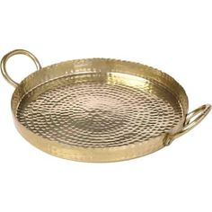 an oval brass tray with handles