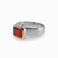 This sun-kissed gem will blast color and inventiveness to your everyday wear with its beautiful orange and red-orange tone. This translucent stone will enhance the wearer's analytical and precision abilities. It guards against envy, fear, and fury, as well as sadness, and brings a loving spirit. This Carnelian Ring clears negativity and enhances perception, bringing to light one's natural talents, abilities, physical vitality, personal strength, and compassion. Stone Origin: India Current Size: Carnelian Ring Men, Orange Ring, Orange Tone, Carnelian Ring, Sun Kissed, Everyday Wear, Rings For Men, Ring Size, Gems