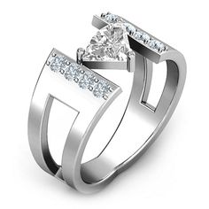 a white gold ring with a heart shaped diamond