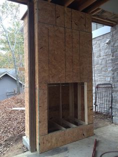 the inside of a house being built with plywood and wood framing on the side