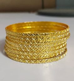 "Indian Gold Bangle, Gold Bracelet Bangle For Women, Stacking Bangle, Gold Bangles, Bridesmaid Gifts jewelry, gift for her, Mother's day gift ♥ DETAILS ♥ *Materials: Brass *Size: All sizes are available. ♥ DELIVERY ♥ *IMPORTANT: Before placing an order, please double-check check your delivery address is correct and complete to avoid delays and lost packages. *You can return your purchased item within 15 days after successful delivery. *We offer a 100% \"Money Back Guarantee\" if you are not satisfied with your purchase. MORE RINGS: https://www.etsy.com/in-en/shop/JewelryIndiaArt Thank you for visiting our shop! If you have any questions, please do not hesitate to send us a message.     JewelryIndiaArt" Gold Bracelet Bangle, Gold Arm Band, Gold Bangles Indian, Bangle Gold, The Bangles, Bridesmaid Gifts Jewelry, Gold Armband, Stacked Bangles, Gifts Jewelry