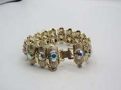 superb vintage gold tone bracelet with rows of crystal rhinestones, very sparkly, high quality, lovely condition, amazing piece, 7-inch , rare piece, Vintage Gold Jeweled Crystal Bracelet, Vintage Gold Bracelets With Bling, Vintage Gold Bracelets With Sparkling Details, Vintage Gold Bling Bracelets, Gold Jeweled Crystal Metal Bracelet, Gold Costume Jewelry Bracelets With Sparkling Stones, Gold Jeweled Crystal Costume Bracelet, Gold Crystal Bracelet With Sparkling Stones, Glamorous Gold Crystal Bracelet With Sparkling Stones