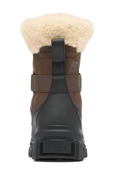 Keep your feet warm and dry in this waterproof boot with a genuine-shearling collar, cozy lining and toasty insulation. It's set on a thick rubber sole for stomping through wet trails, while lightweight cushioning provides all-day comfort. Waterproof: protects against rain, puddles and slush to keep feet dry in wet conditions 7" shaft Lace-up style 200 g/m² insulation Outdry™ technology offers comfortable waterproof protection while still providing a breathable foot environment Removable, cushio Insulated Waterproof Brown Boots For Winter, Insulated Brown Waterproof Boots For Winter, Rugged Brown Waterproof Boots For Cold Weather, Rugged Outdoor Shearling Boots, Rugged Shearling Boots For Outdoor, Brown Outdoor Boots With Faux Fur Lining, Brown Boots With Faux Fur Lining For Outdoor, Brown Boots With Faux Fur Trim For Cold Weather, Winter Insulated Shearling Boots