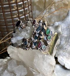 Amazing One of a Kind Artisan Multi Gemstone 999 Sterling Silver Druzy Rock Crystal Vintage Bracelet Wearable Art Stunning Gemstones of Druzy Quartz Rock Crystal , Opal , Garnet , Saphire , chrysoprase, pink turmaline weighs 87 grams of Gemstones and silver face is over 1 inch tall Artisan Multi-stone Bangle Bracelet, Collectible Gemstone Bangle Bracelets, Unique Multi-stone Bangle Bracelet, Unique Multi-stone Bangle Bracelets, Artisan Multi-stone Bangle Jewelry, Multicolor Multi-stone Unique Bracelets, Unique Multicolor Multi-stone Bracelets, Unique Multicolor Multi-stone Bracelet, Adjustable Multi-stone Unique Bracelet