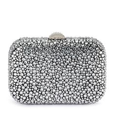 With its curved lines and glossy hardware, the Casey Hot Fix Encrusted Clutch is a total show stopper. The rounded square shape fits comfortably in the palm of your hand. Wear it as a shoulder bag or wear it as a clutch by tucking the shoulder chain inside. W18cm x H12cm x D6cm Shoulder chain drop length 50cm Encrusted block lock closure Removable shoulder chain Fits a smart phone Embellished Rectangular Clutch For Cocktail, Rectangular Embellished Clutch For Cocktail, Silver Crystal Embellished Evening Bag For Cocktail, Silver Crystal Embellished Cocktail Evening Bag, Luxury Silver Clutch For Cocktail, Luxury Silver Clutch For Cocktail Events, Luxury Silver Cocktail Clutch, Glamorous Rectangular Cocktail Evening Bag, Silver Evening Bag With Rhinestones For Cocktail