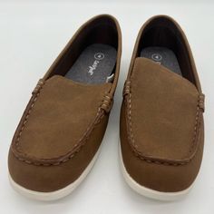 The Product Is A Pair Of Slip-On Sneakers For Boys, Made By The Brand Cat & Jack. They Are Brown In Color And Made Of Manmade Materials. The Shoes Are Available In Various Sizes For Uk, Us, Eu, And Au Shoe Sizes. They Are Suitable For Casual And Travel Occasions And Have Slip-On Features And Fastening. The Shoes Are Designed For Regular Shoe Width And Are Ideal For Summer, Fall, And Spring Seasons. Brown Casual Sneakers With Soft Sole, Casual Brown Sneakers With Soft Sole, Sneakers For Boys, Sneakers Brown, Slipon Sneakers, Boy Cat, Brown Leather Loafers, Cat And Jack, Brown Sneakers