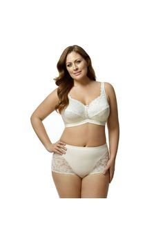 The perfect everyday bra, this pretty style is made with scalloped floral lace cups with a hidden sling that provides great support. Medium coverage will hold you in without sacrificing style. Adjustable straps Nylon/spandex | Plus Size Women's Stretch Lace Softcup Bra by Elila in Ivory (Size 46 F) Swim Leggings, Occasion Dresses Wedding, High Waisted Swim, Womens Scrubs, Tunic Tank Tops, Everyday Bra, Swimsuits For All, Pretty Style, Maxi Dress Party