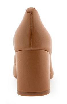 An almond toe defines this classic leather pump elevated by a half-moon block heel and a shock-absorbing sole. Leather upper/synthetic lining and sole Imported Beige Leather Block Heels With 4-inch Heel, Modern Brown Block Heels With Round Toe, Leather Pumps With Padded Heel And Closed Toe, Leather Pumps With 4-inch Heel And Almond Toe, Leather Pump With Sculpted Heel And Closed Toe, Leather Pumps With Sculpted Heel, Leather Pumps With Sculpted Heel And Closed Toe, Leather Pumps With Reinforced Heel And Round Toe, Polyurethane Heels With Stacked Heel And Round Toe