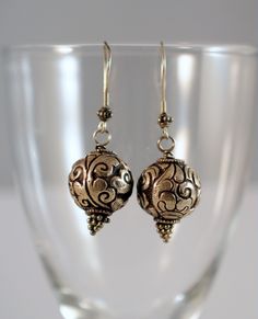 antique cast tibetan silver beads earrings with 925 silver hooks 1,4 cm size beads Traditional Silver Beaded Earrings For Pierced Ears, Traditional Silver Round Bead Earrings, Traditional Silver Nickel-free Beaded Earrings, Traditional Silver Beaded Round Earrings, Traditional Silver Round Beaded Earrings, Traditional Silver Beaded Earrings With Round Beads, Traditional Round Silver Beaded Earrings, Sterling Silver Earrings With Silver Beads, Silver Spiritual Brass Earrings