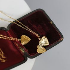 Brand Name: MaytrendsItem Weight: 0.6MIUSCertificate: noMain Stone: NONEMetals Type: Gold FilledGender: WomenNecklace Type: Pendant NecklacesOccasion: PartyChain Type: Link ChainItem Type: NecklacesCertificate Type: Third Party AppraisalStyle: ClassicCertificate Number: noneModel Number: NHQD230is_customized: NoShape\pattern: HeartFine or Fashion: FinePendant Size: 1.33x1.29CMMaterial: Titanium Plated 18K Gold Gold Heart Necklace For Mother's Day Party, Gold Heart Pendant Locket Necklace For Wedding, Dainty Heart Pendant Locket Necklace For Wedding, Gold Heart Charm Locket Necklace For Wedding, Double Heart Charm Locket Necklace For Wedding, Double Heart Locket Necklace With Heart Charm For Wedding, Heart Cut Locket Necklace For Wedding, Double Heart Locket Necklace For Wedding, Elegant Gold Heart Necklace For Party