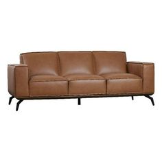 a brown leather couch sitting on top of a wooden frame