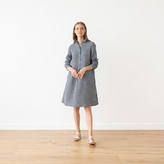 Loose Fit Linen Dress Camilla, long sleeves with pockets. Prewashed, super soft 100% European linen, no shrinkage. Blue and white or navy with white checked linen. With a fluid, drapey silhouette and long sleeves, our Camilla linendress is versatile, comfortable and effortlessly stylish. Thanks to the understated gathered detailing to the cuffs and back, delicate buttons and two handy pockets, this linen dress works as beautifully on a summer picnic as in the office. DETAILS: * Made in Lithuania Shirt Dress With Pockets, Linen Dress Summer, Office Details, Gingham Linen, Summer Linen Dresses, Linen Shirt Dress, Summer Linen, European Linens, Summer Picnic