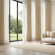 a living room with sliding glass doors and beige curtains on the windowsill, along with a white couch