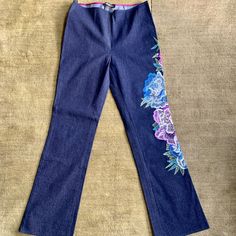 Beautiful Vintage Denim Fro Vivienne Tam. Bought When I Was Living In Asia Back In The Days. Inseam 30.75 Inches. Size 1 - In Vienna Tam. I Usually Wear A Size 4 In Usa Or Size 26 Jeans. There Is A Bit Stretch To The Fabric. Blue Floral Embroidered Wide Leg Bottoms, Blue Straight Leg Bottoms With Floral Embroidery, Blue Embroidered Straight Leg Bottoms, Embroidered Blue Straight Leg Pants, Blue Embroidered Straight Leg Pants, Blue Straight Leg Pants With Floral Embroidery, Festive Fitted Bottoms With Intricate Embroidery, Blue Denim Floral Print Pants, Blue Floral Print Denim Pants