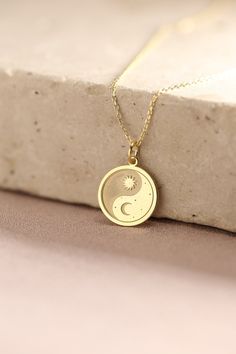 Gold Moon And Sun Pendant - Moon And Sun Gold Necklace ● Material of pendant: Solid Gold 14k ( REAL GOLD ) ● Metal Stamp: 14k ( REAL GOLD ) ● The pendant is available in 5 sizes: - 12,7 mm / 0.5 inches (Diameter) - 14,0 mm / 0,55 inches ( Diameter ) In the photos - 15,3 mm / 0.6 inches ( Diameter ) - 16,5 mm / 0,65 inches ( Diameter ) - 19,1 mm / 0,75 inches ( Diameter ) ( In the photos the size is 14mm / 0.55 inches Diameter ) ( Jump Ring inner diameter: 4 mm ) ● Material of chain: Solid gold 1 Moon And Sun Pendant, Gold Moon-shaped Engraved Necklace, Gold Half Moon Jewelry For Anniversary, Celestial Half Moon Gold Jewelry, Gold Plated Moon Phase Jewelry, Gold Half Moon Jewelry With Moon Phase Detail, 14k Gold Jewelry With Moon Phase Detail, Silver Half Moon 14k Gold Jewelry, 14k Yellow Gold Moon Necklace