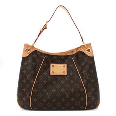 This is an authentic LOUIS VUITTON Monogram Galliera PM. This hobo-style handbag is crafted of Louis Vuitton's signature monogram canvas in brown. It features a vachetta cowhide leather shoulder strap, piping,trim, and brass hardware. The top opensto a beige microfiber interior with a large snap pocket and pockets. Hobo Style, Brass Hardware, Monogram Canvas, Authentic Louis Vuitton, Cowhide Leather, Piping, Louis Vuitton Monogram, Shoulder Strap, Louis Vuitton