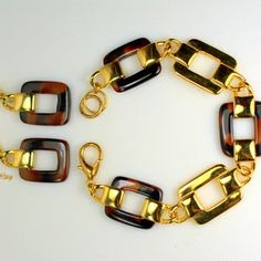 Link Bracelet and Earrings Gold Swirl Butterscotch Lucite, Runway Jewelry Set Brown Rectangular Metal Jewelry, Rectangular Brown Metal Jewelry, Handmade Rectangular Retro Jewelry, Retro Brown Jewelry For Gift, Runway Jewelry, Shell Jewelry, April 2024, Wedding Jewelry Sets, Gorgeous Necklaces