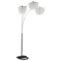 three light floor lamp with crystal cubes on the top and bottom, in chrome finish