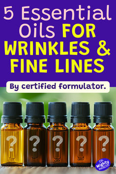 Image with purple background and large text reading "5 Essential Oils for Wrinkles & Fine Lines". Subtitle says "By certified formulator." Below are 5 amber glass essential oil bottles with black caps, each labeled with a question mark. The bottles are arranged in a row against a blurred green background. An "Oh Mighty Health" logo appears in the bottom right corner. Reduce Fine Lines And Wrinkles, Herbs For Wrinkles, Best Essential Oils For Face, Forehead Wrinkles Remedies, Home Remedies For Face, Skin Tightening Essential Oil, Natural Wrinkle Reducer