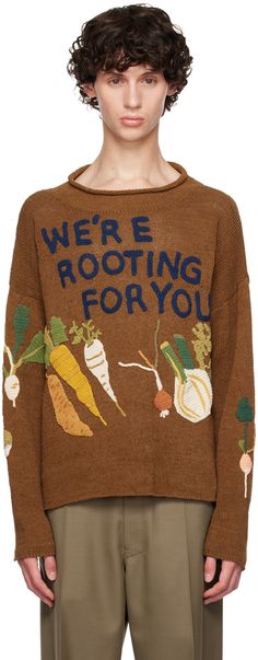 Hand-knit and hand-dyed organic cotton sweater. · Rolled edge at funnel neck · Hand-crocheted text and graphic appliqués at front · Dropped shoulders Supplier color: Brown rooting for you Needle Felted Sweater, Embroidery On Sweaters, Orange Sweater Outfit, Postpartum Fashion, Story Mfg, Nautical Sweater, Rollneck Sweater, Tree Sweater, Knit Vest Pattern