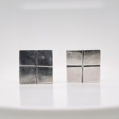 A very fine, three-piece Mexican silver modernist square cube clip-on earrings  and brooch.  By William Spratling.   With cube-shaped screw back earrings with screwbacks and a conformning cube-shaped brooch.     Simply a terrific parure from on of Mexico's jewerly masters!  Date: 20th Century  Overall Condition: It is in overall good, as-pictured, used estate condition. The three pieces have a wonderful, lived surface with some very fine & light surface scratches and other signs of expected ligh Modern White Gold Clip-on Earrings As Gift, Modern Sterling Silver Clip-on Earrings For Formal Occasions, Minimalist Metal Clip-on Earrings For Formal Occasions, Modern White Gold Clip-on Earrings For Gift, Modern Rectangular Cufflinks With Polished Finish, Modern Rectangular Polished Cufflinks, Modern Clip-on Earrings With Polished Finish, Modern Hallmarked Clip-on Earrings For Formal Occasions, Modern White Gold Sterling Silver Cufflinks