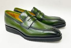 Calfskin Slip-On Penny Loafer Olive Gorgeous Calfskin slip-on Penny Loafer from our Exclusive Maurice collection features full Leather Lining, a clean welt and a tone on tone Lightweight Rubber Sole!