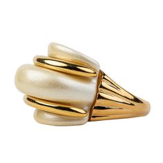 Product Description: Add serious bling to your collection with this stunning gold and pearl double ribbed domed adjustable ring. Dimensions: 1"x1" (Adjustable 5-8) Style Number: 2013RWP Blue Sapphire Halo Ring, Crystal Ball Ring, Princess Diana Ring, Ribbed Ring, Rib Ring, Diana Ring, Starfish Ring, Sapphire Halo Ring, Double Finger Ring