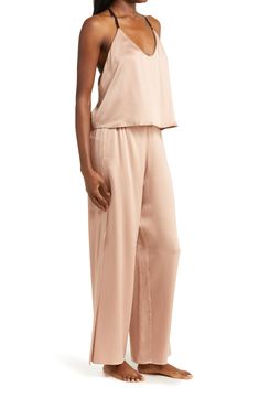 These mulberry-silk pajamas are naturally hypoallergenic, breathable and ideal for those with sensitive skin; best part—they can go in the washing machine. 22" top length; 29" inseam; 28" leg opening; 14" front rise; 14" back rise (size Medium) Top has scoop neck; adjustable racerback straps Pants have partial elastic waist; side-seam pockets 100% silk Machine wash, dry flat Imported Strap Pants, Silk Cami, Hooded Dress, Column Dress, Silk Pajamas, Spring Trends, Pajama Set Women, Sleepwear Women, Mulberry Silk