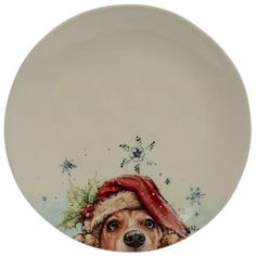 a plate with a dog wearing a santa hat