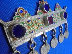 This lovely piece is in perfect shape and can be made into a taounza/headdress or into a necklace that hangs on the chest, it has no flaws and the enamel is bright. Size- 4 inches wide, 2 3/4 inches long. Weight-48 grams. Moroccan Jewelry, Old Coins, Silver Enamel, Silver Bangles, Jewelry Vintage, A Necklace, Headdress, Silver Pendant, Antique Silver