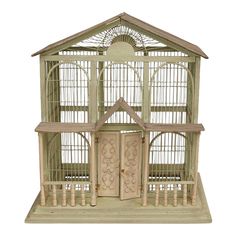 a birdcage with two doors and a window on the outside, in front of a white background