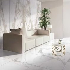 a modern living room with marble walls and flooring