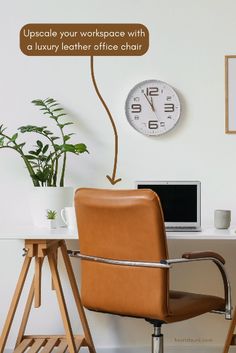 a brown chair sitting in front of a desk with a clock on the wall above it