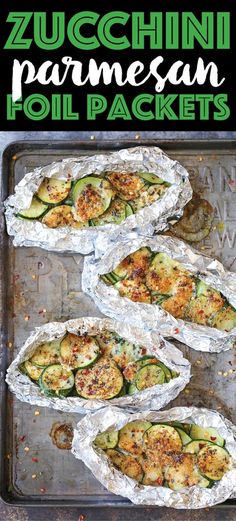 zucchini parmesan foil packets on a baking sheet with text overlay