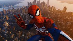 a spider - man is standing in front of a cityscape with his hands up