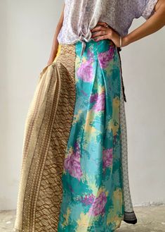 "Original long patchwork skirt in silk fabric made in one free size with easy wrap tie belt  MEASURE Free size Fits most S-L Length 39\" MATERIAL * silk blend Thank you for looking" Multicolor Silk Flowy Skirt, Multicolor Flowy Silk Skirt, Multicolor Silk Skirt, Bohemian Multicolor Silk Sarong, Green Flowy Patchwork Maxi Skirt, Green Flowy Maxi Skirt With Patchwork, Bohemian Silk Wrap Skirt For Summer, Bohemian Silk Maxi Skirt For Spring, Spring Bohemian Silk Maxi Skirt