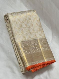 Bridal Collection Beige Color Pure Kanchipuram Silk Saree | Indian Traditional Ethnic Saree | Wedding or Party Wear Saree | Handwoven Gift Saree for Her Product Details : Saree Type : Pure Kanchipuram Silk Saree Golden Zari, Silk Mark Certified Blouse Piece : Yes (Un-Stitched) Saree Length : 5.5 Meters Blouse Piece Length : 80 cm Saree Weight : 0.9 kg Saree Fabric : Pure Kanchipuram Silk  Color : As shown in the picture Work : weaving Pattern : designer Occasion: Party Wear, Formal Wear, Festiva Gold Brocade Pre-draped Saree With Zari Weaving, Gold Brocade Pre-draped Saree With Zari Work, Semi-stitched Paithani Silk Saree For Wedding, Katan Silk Pre-draped Saree For Wedding And Diwali, Wedding Pre-draped Saree With Zari Weaving, Traditional Gold Pre-draped Saree With Motifs, Traditional Pre-draped Saree For Wedding And Diwali, Wedding Art Silk Cream Blouse Piece, Cream Tissue Silk Traditional Wear With Drape