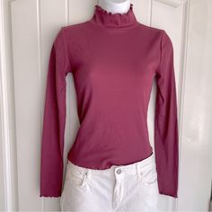 Petal Mauve Forever 21 Lettuce Edge Ribbed Long Sleeve Mock Neck Top Small Nwot. This Gorgeous Cotton-Blend Top Is A Classic Yet Spicy Piece To Pair With Boots And Jeans Or A Skirt. It Is New Without Tags, And In Immaculate Condition. Measurements Are 16” Pit-To-Pit, And 20” In Length. The Top Does Have A Little Bit Of Stretch To It. (Fits A Little On The Shorter Side; Most Regular Tops Are About 23”.) Comes From A Smoke-Free, Doggo Loving Home :) Winter Purple Fitted Tops, Fitted Purple Winter Tops, Fitted Purple Tops For Winter, Purple Ribbed Stretch Top, Purple Stretch Tops For Winter, Purple Stretch Top For Winter, Purple Stretch Winter Tops, Purple Stretch Ribbed Tops, Stretch Purple Ribbed Tops