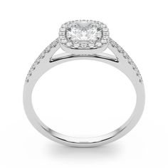 a white gold engagement ring with diamonds on the shoulders