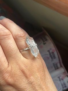 1. #ClearQuartzRing
2. #GemstoneRing
3. #WireWrapped
4. #NaturalQuartz
5. #CrystalJewelry
6. #BohoStyle
7. #HandmadeJewelry
8. #HealingCrystals
9. #SpiritualJewelry
10. #CrystalHealing
11. #QuartzPoint
12. #UniqueJewelry
13. #CrystalLove
14. #ClearQuartzCrystal
15. #WireWrappedJewelry
16. #BohemianStyle
17. #GemstoneLove
18. #NaturalBeauty
19. #SpiritualGems
20. #CrystalVibes
21. #ClearQuartzRingSize6.5
22. #CrystalEnergy
23. #HandcraftedJewelry
24. #BohoChic
25. #GemstoneMagic
26. #NaturalStones
27. #SpiritualAdornment
28. #CrystalJewels
29. #ClearQuartzPoint
30. #WireWrappedRings Spiritual Silver Crystal Ring, Spiritual Hypoallergenic Jewelry Ring, Hypoallergenic Spiritual Ring Jewelry, Silver Crystal Ring For Healing, Spiritual Round Crystal Healing Ring, Spiritual Healing Crystal Ring, Adjustable Round Crystal Healing Ring, Minimalist Crystal Ring For Healing, Sterling Silver Crystal Ring For Healing