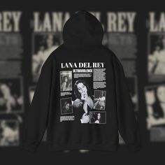 This Unisex heavy blend hooded sweatshirt is a stylish tribute to Lana Del Rey, capturing the essence of her ethereal and nostalgic vibe. Made from 100%  soft, breathable US cotton, it ensures comfort and durability for everyday wear. The design features a striking portrait of Lana Del Rey, surrounded by vintage-inspired floral elements and intricate patterns, reminiscent of her iconic aesthetic. - Made with a medium-heavy fabric (8.0 oz/yd² (271 g/m that consists of 50% cotton and 50% polyester for that cozy feel and warmth you need in a hoodie. - The classic fit along with the pouch pocket and the tear-away label make for a highly comfortable, scratch-free wearing experience.  - The color-matched drawcord and the double-lined hood add a stylish flair and durability that tie everything to Lana Del Rey Merchandise, Lana Del Rey Design, Lana Del Rey Hoodie, Lana Del Rey Outfits, Iconic Aesthetic, Lana Del Rey Ultraviolence, Kawaii Store, Lana Del Ray, Floral Elements