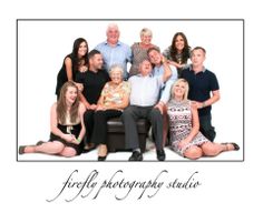 a group of people sitting next to each other in front of a white background with the words firefly photography studio