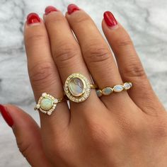 A stunner to stack. DETAILS Metal - 14k yellow gold Stone(s) - 0.80tcw oval opals Band width - 2mm WHY WE LOVE IT This five-stone ring features a 0.80tcw of east to west oval opals bezel set in 14k yellow gold. This ring can do it all - wear this as your go-to ring for stacks and layering. Gift it to your most beloved October baby. Or, if opals have special meaning, seal your vows with this as your wedding band. More from our Opal + Moonstone Collection. SHIPPING + RETURNS Currently sized at a 7 Oval Diamond Moonstone Ring In Yellow Gold, Oval Moonstone Ring With Diamonds In Yellow Gold, Gold Oval Multi-stone Stackable Rings, 14k Gold Oval Diamond Stackable Ring, Oval 14k Gold Stackable Diamond Ring, Heirloom Oval Opal Ring With Multi-stone, 14k Gold Multi-stone Oval Cabochon Ring, Oval Opal Halo Ring In 14k Gold, Classic Three Stone Oval Opal Ring