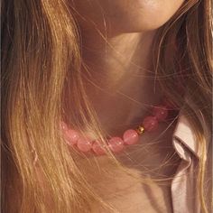 Inspired by resort fashion, our Summer Pink Beaded Collarbone Chain adds a vibrant and chic touch to your summer style. Carefully crafted with delicate pink beads, it's the perfect accessory for sunny days and seaside bliss. Elevate your vacation wardrobe with this unique piece. Process: 18K gold plated Material: Copper/optimized natural stone (12mm) Size: Necklace inner circumference 39-44cm Weight about: 64g Trendy Pink Beaded Necklaces For Summer, Trendy Pink Beads For Beach, Pink Bohemian Single Strand Beaded Necklaces, Bohemian Pink Single Strand Beaded Necklaces, Pink Single Strand Bohemian Beaded Necklaces, Bohemian Pink Necklace With Polished Beads, Summer Beach Beaded Necklaces With Gemstone Beads, Summer Large Beads Pink Jewelry, Pink Beaded Necklace For Summer Gifts