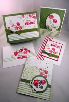 four cards with different designs on them