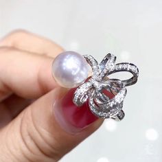 Highline: Famous Style Product Information OriginJapan MaterialAkoya Pearl, 18k Gold w/ Diamond Dimensions- Pearl Shaped: Round Size: 9-9.5 mm Quality: AAA Nacre: Very Thick Color: Rose overtone Luster: Very High Accessories Metal: 5.7ct of 18k White Gold Other: 0.45ct of SI Quality Natural Diamond Luxury Brilliant Cut Diamond Pearl Ring, Luxury Pearl And Diamond Ring With Brilliant Cut, Fine Jewelry Diamond Pearl Ring In White Gold, White Diamond Pearl Ring, Luxury Diamond Pearl Ring For Anniversary, Fine Jewelry White Gold Pearl Ring With Diamond, Diamond White Pearl Ring With Brilliant Cut, White Gold Pearl Ring With Diamond Pave Setting, White Gold Pearl Ring With Pave Diamond Setting